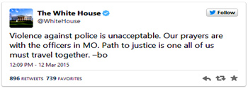 Obama recognizes police officers shot in Ferguson with a useless "tweet,"  as his Marxist protestors continue to be encouraged to march and cause riots via Obama's spokesman, Al Sharpton, rioters shouting "You can't stop the revolution." - Webmaster   