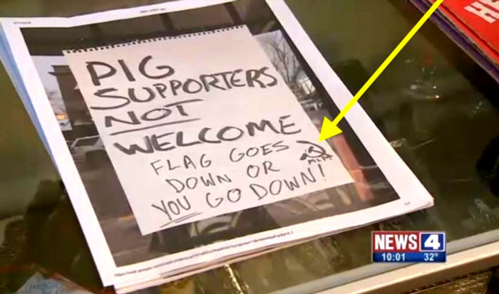 "A month after taking down the thin blue line flag — which is now displayed inside her 32-year-old store — Elder told the station she found a large handwritten sign on the front window of Elder’s Antiques that read: 'Pig supporters not welcome. Flag goes down or you go down.'  On the right bottom corner of the sign was a hammer and sickle — presumably standing for communism and the former Soviet Union — along with the letters 'MLM,' which KMOV said often stands for Marxism-Leninism-Maoism." - The Blaze 