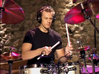 Thomas Lang presents the unique and innovative system that he has used to develop his awesome speed, control, finesse and coordination-a step-by-step system that will allow you to hone your drumming chops so that you can play more effectively, in any style of music.  