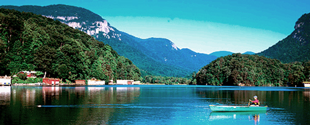 Located in Western North Carolina, Lake Lure sits in the heart of Hickory Nut Gorge. East of Asheville, the Rocky Broad River tears its way in a series of rapids down through Hickory Nut Gap. This crystal clear water flows through a valley shaped roughly in the form of a Maltese cross to make Lake Lure. 